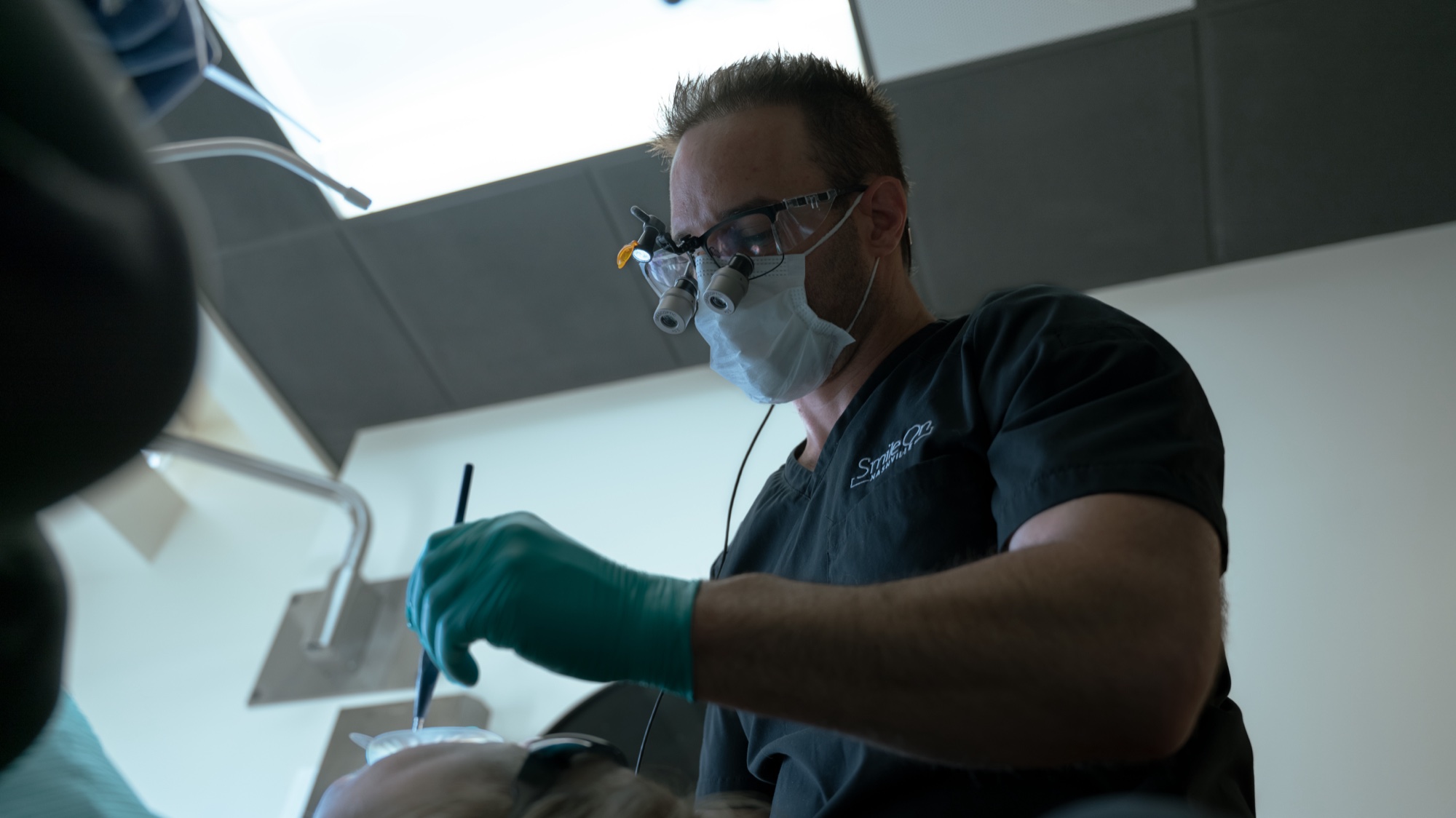 Dr. Trembley working in the Smile On Nashville studio