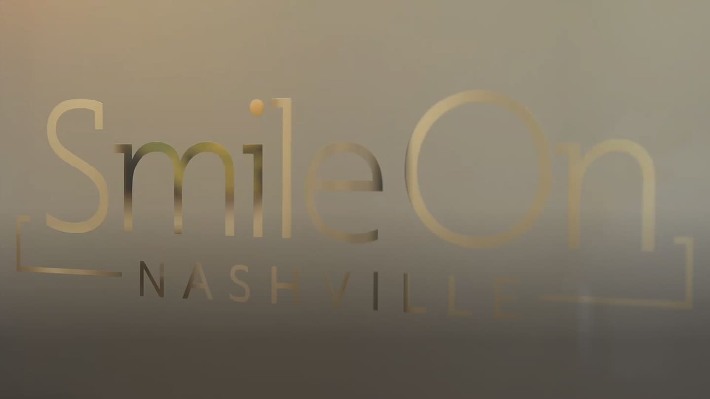 Smile On Nashville gold office signage