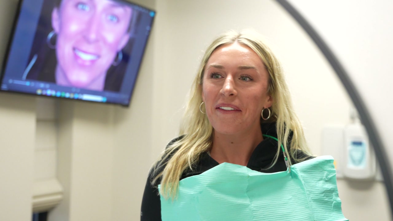 Blake reacting to her new smile at Smile On Nashville
